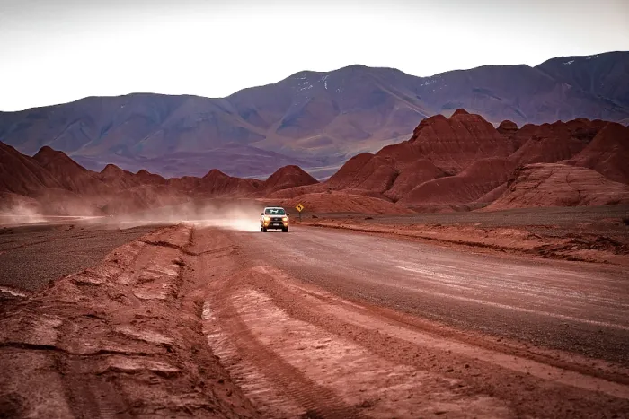 Framed Print : Off-road vehicle traveling on an empty road, Labyrinth Desert, Salta province, Puna, Argentina Framed Print : Off-road vehicle traveling on an empty road, Labyrinth Desert, Salta province, Puna, Argentina
