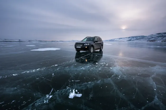 Framed Print : An offroad car over a flat ice at the lake Baikal, Irkutsk region, Siberia, Russia Framed Print : An offroad car over a flat ice at the lake Baikal, Irkutsk region, Siberia, Russia