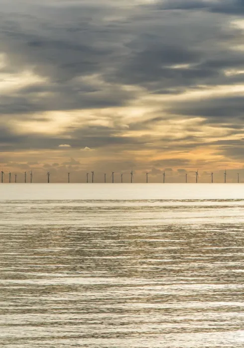 Framed Print : Offshore wind farm as viewed from Brighton beach, East Sussex, England Framed Print : Offshore wind farm as viewed from Brighton beach, East Sussex, England