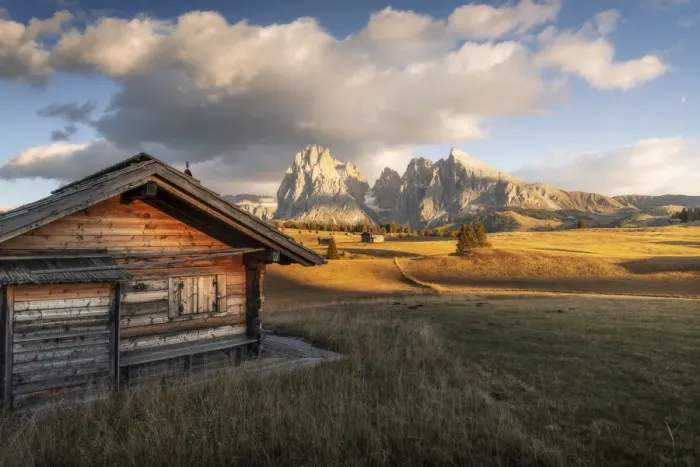 Framed Print : An old cabin lost in the meadows of the Alpe di Siusi (Seiser Alm) during an early autumn sunset, with the Sassolungo and Sassopiatto in the background. Dolomites, Italy Framed Print : An old cabin lost in the meadows of the Alpe di Siusi (Seiser Alm) during an early autumn sunset, with the Sassolungo and Sassopiatto in the background. Dolomites, Italy