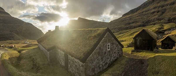 The old Duvugarðar farm and the church of Saksun. Stryemoy, Faroe Islands