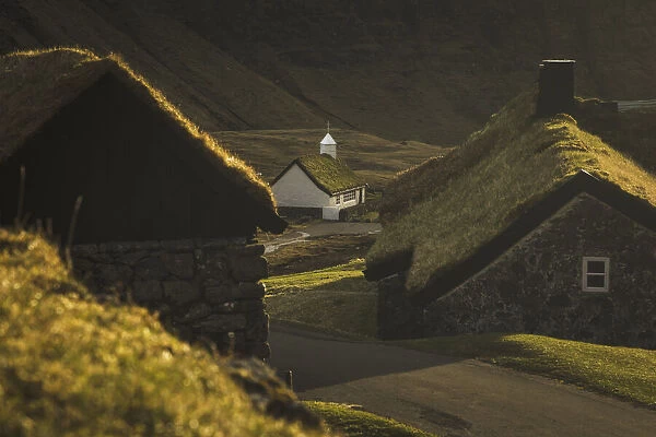 The old Duvugarðar farm and the church of Saksun. Streymoy, Faroe Islands