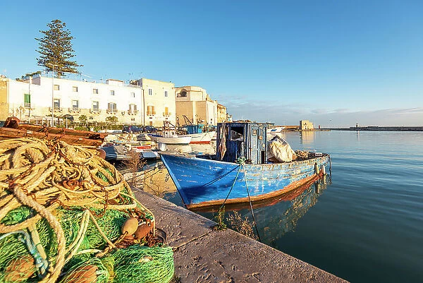 old fishing boat in the port of Trani. Europe, Italy, Puglia, Trani, Trani district