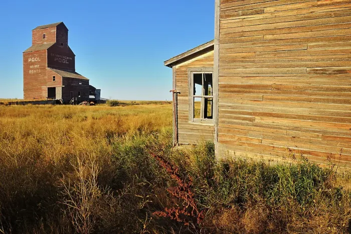 Framed Print : Old general store and grain elevator in ghost town Bents Saskatchewan, Canada