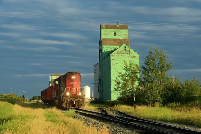 Framed Print : Old grain elevators with train on the Canadian Prairie Sexsmith, Alberta, Canada