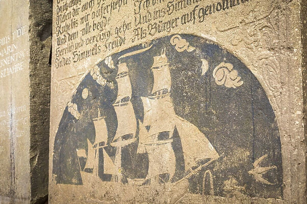 Old gravestone at the Church of St. Severin in Keitum, Sylt, Schleswig-Holstein, Germany