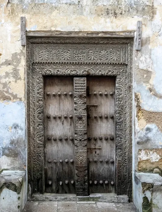 Framed Print : Old heavy carved wooden door, Stonetown, Zanzibar, Tanzania Framed Print : Old heavy carved wooden door, Stonetown, Zanzibar, Tanzania