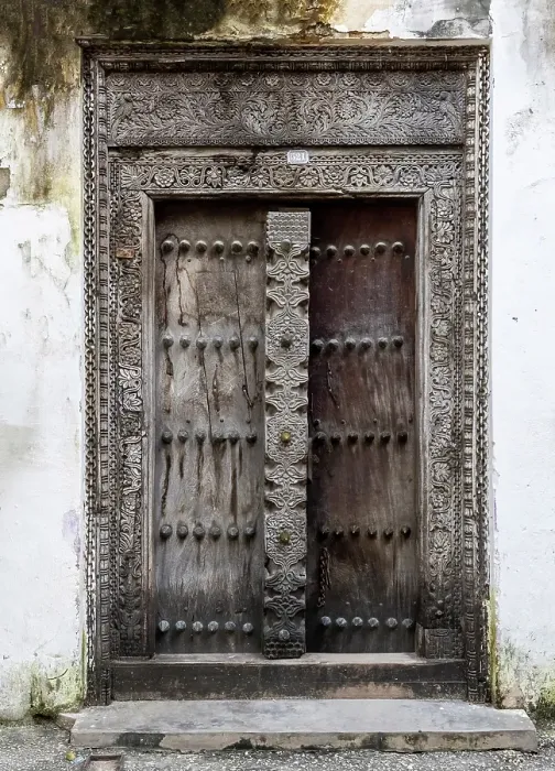 Framed Print : Old heavy carved wooden door, Stonetown, Zanzibar, Tanzania Framed Print : Old heavy carved wooden door, Stonetown, Zanzibar, Tanzania