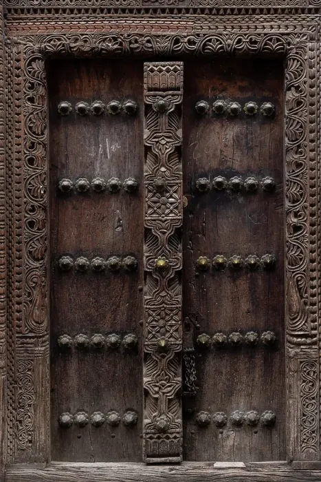 Framed Print : Old heavy carved wooden door, Stonetown, Zanzibar, Tanzania Framed Print : Old heavy carved wooden door, Stonetown, Zanzibar, Tanzania
