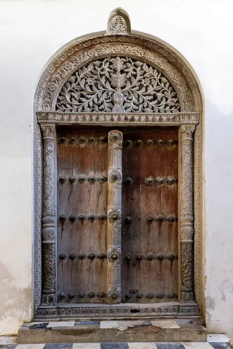 Framed Print : Old heavy carved wooden door, Stonetown, Zanzibar, Tanzania Framed Print : Old heavy carved wooden door, Stonetown, Zanzibar, Tanzania