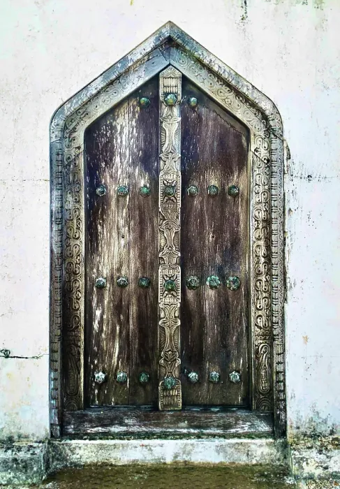 Framed Print : Old heavy carved wooden door, Stonetown, Zanzibar, Tanzania Framed Print : Old heavy carved wooden door, Stonetown, Zanzibar, Tanzania
