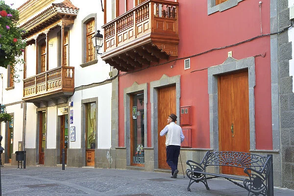 Old Houses With The Traditionally Carved Balconies On Calle Real de la Plaza, The