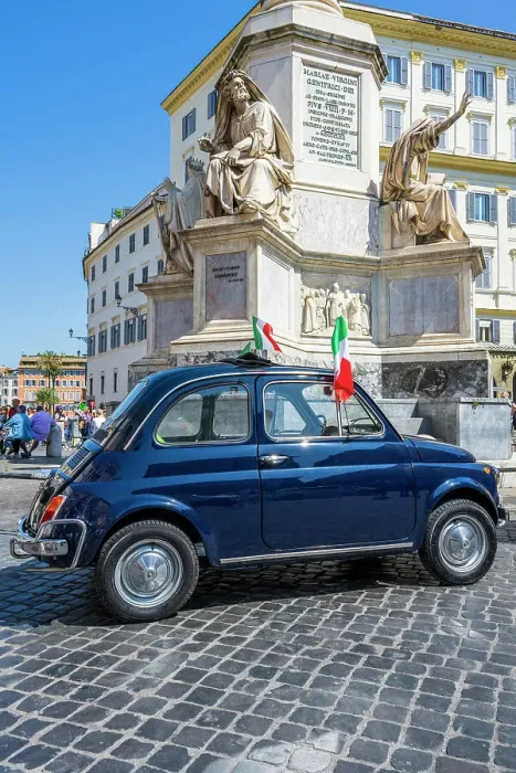 Framed Print : Old iconic blue Fiat 500 car with Italian flags parked in a cobbled square, Rome, Lazio, Italy