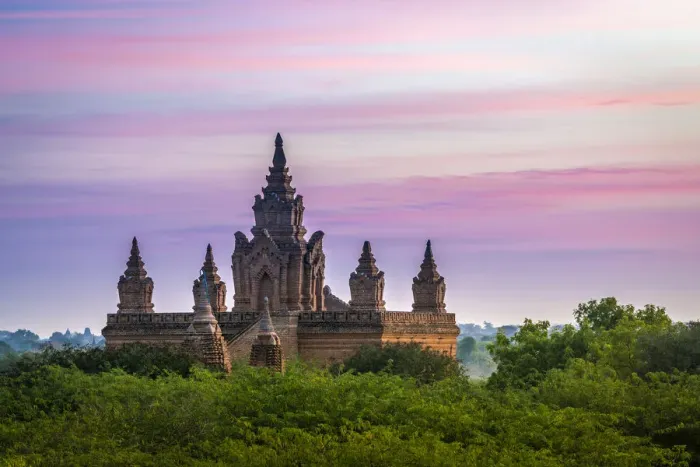 Framed Print : Old pagoda amidst trees against purple sky during sunrise, Bagan, Mandalay Region