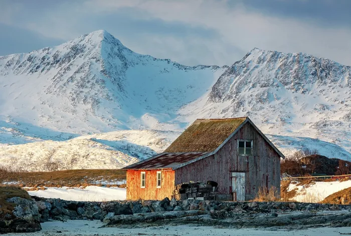 Framed Print : Old red wooden barn (rorbu) and snow-covered mountains, Sommeroy, near Tromso, Norway Framed Print : Old red wooden barn (rorbu) and snow-covered mountains, Sommeroy, near Tromso, Norway