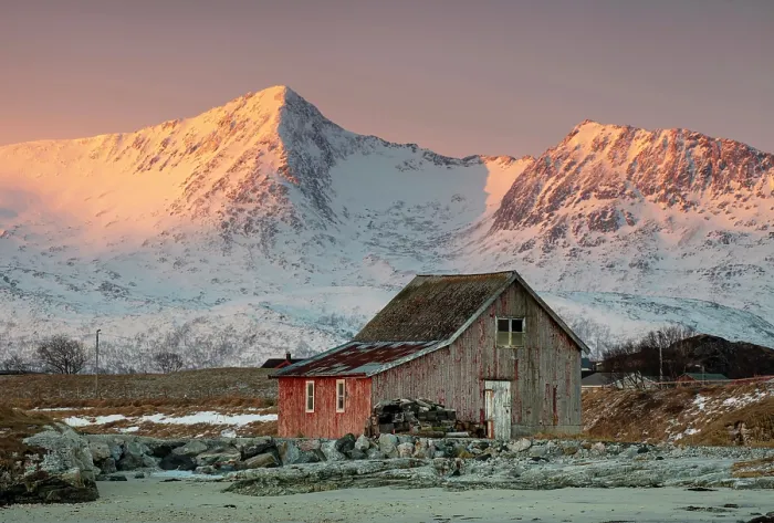 Framed Print : Old red wooden barn (rorbu) and snow-covered mountains at sunrise, Sommeroy, near Tromso, Norway Framed Print : Old red wooden barn (rorbu) and snow-covered mountains at sunrise, Sommeroy, near Tromso, Norway