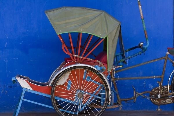 Old rickshaws & house front, Georgetown, Penang, Malaysia