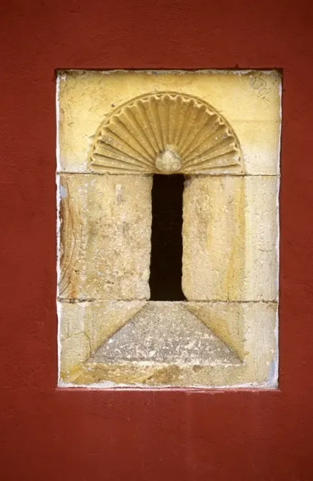 Framed Print : An old stone alcove is framed by a red painted wall in a mansion in Llanes Framed Print : An old stone alcove is framed by a red painted wall in a mansion in Llanes