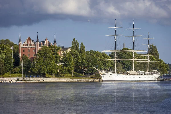 Old tall ship Af Chapman in front of Skeppsholmen island with Admiralitetshuset