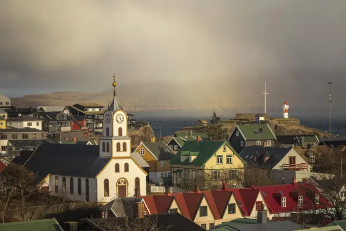 Framed Print : The old part of Torshavn at sunset. In the background the island of Nolsoy. Streymoy, Faroe Islands Framed Print : The old part of Torshavn at sunset. In the background the island of Nolsoy. Streymoy, Faroe Islands