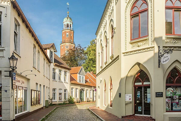Old town alley with a view of the Great Church, Leer, East Frisia, Lower Saxony, Germany
