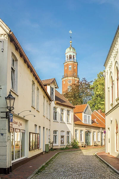 Old town alley with a view of the Great Church, Leer, East Frisia, Lower Saxony, Germany