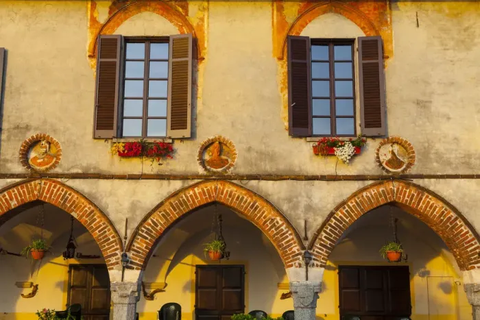 Framed Print : Old Town Building Facade illuminated at sunrise, Arona, Lake Maggiore, Piedmont, Italy Framed Print : Old Town Building Facade illuminated at sunrise, Arona, Lake Maggiore, Piedmont, Italy