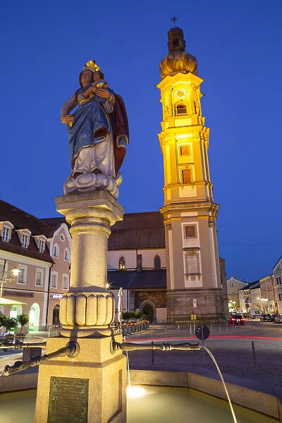 Old Town Water Fountain & Church illuminated at Dusk, Deggendorf, Lower Bavaria, Bavaria