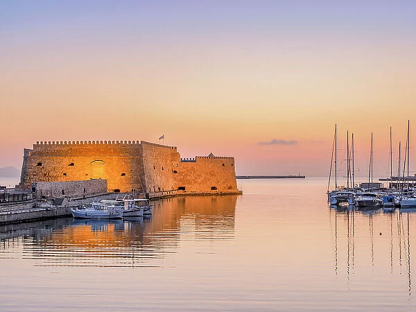 Old Venetian Port and The Koules Fortress at dawn, City of Heraklion, Crete, Greece