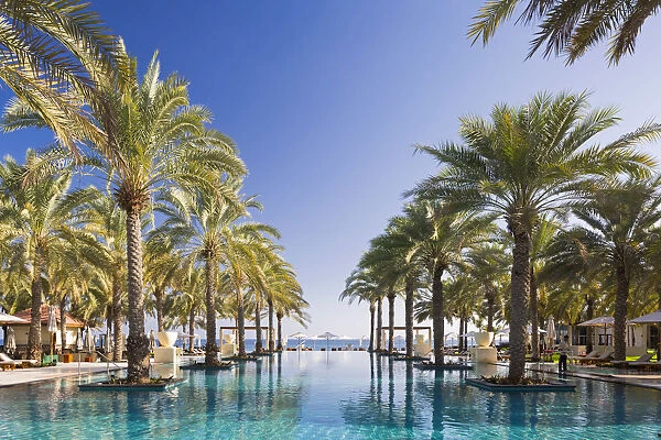 Oman. Muscat Governorate, Muscat. The 50 metre infinity pool at the Ritz Carlton Al