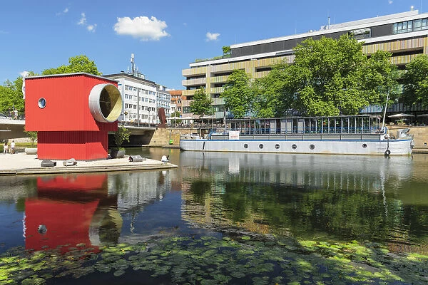 One-Man-House (Architect Thomas Schutte) and show boat on Neckar River, Heilbronn, Baden-Wurttemberg, Germany