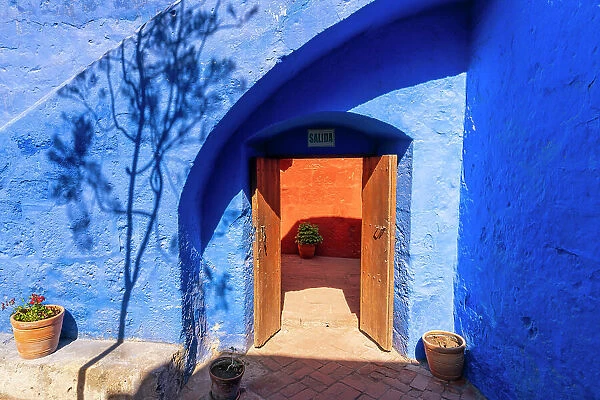 Open door with blue wall at Monastery of Santa Catalina de Siena, UNESCO, Arequipa, Arequipa Province, Arequipa Region, Peru