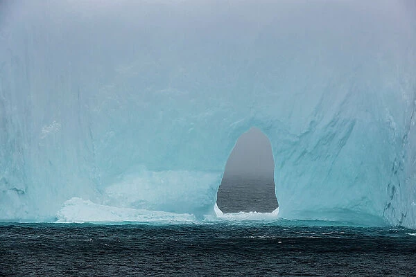 Opening in iceberg floating in the Drake Passage, Antarctica