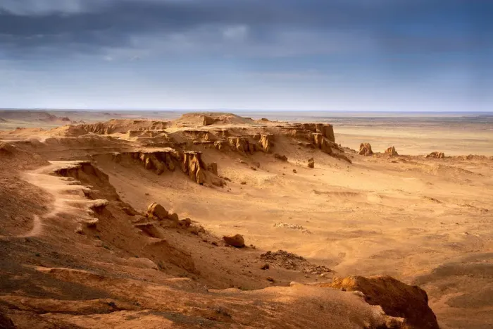 Framed Print : The orange rocks of Bayan Zag, commonly known as the Flaming Cliffs in the Gobi desert