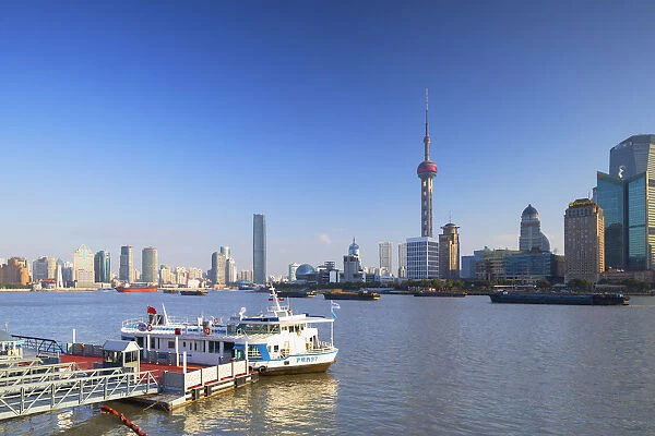 Oriental Pearl Tower on Pudong and buildings along Huangpu River, Shanghai, China