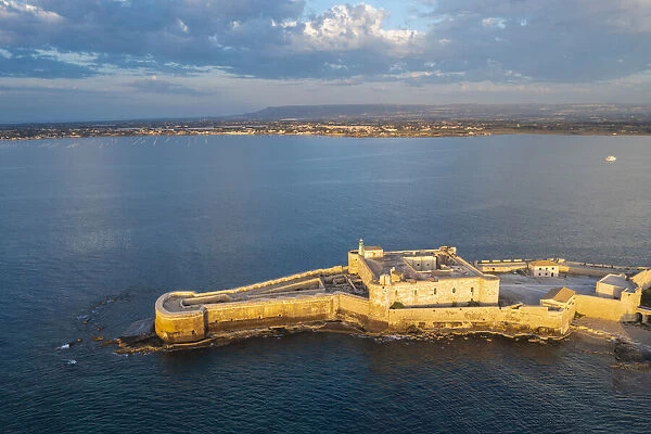 Ortygia island, Syracuse, Sicily, Italy. The citadel Castello Maniace at the far point of