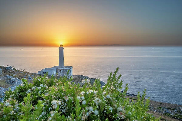 Otranto, province of Lecce, Salento, Apulia, Italy. Sunrise at the lighthouse Faro della Palascia. This lighthouse marks the most easterly point of the Italian mainland