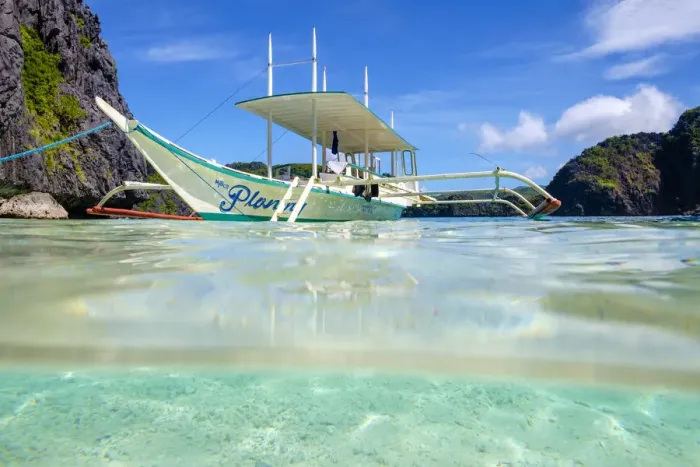 Framed Print : Outrigger boat anchored at Talisay Beach, Tapiutan Island, El Nido, Palawan, Philippines Framed Print : Outrigger boat anchored at Talisay Beach, Tapiutan Island, El Nido, Palawan, Philippines