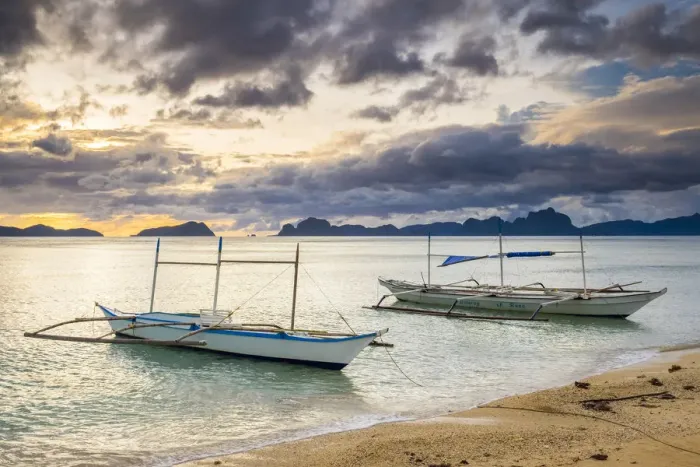 Framed Print : Outrigger boats at sunset on Dolarog Beach, El Nido, Palawan, Philippines Framed Print : Outrigger boats at sunset on Dolarog Beach, El Nido, Palawan, Philippines