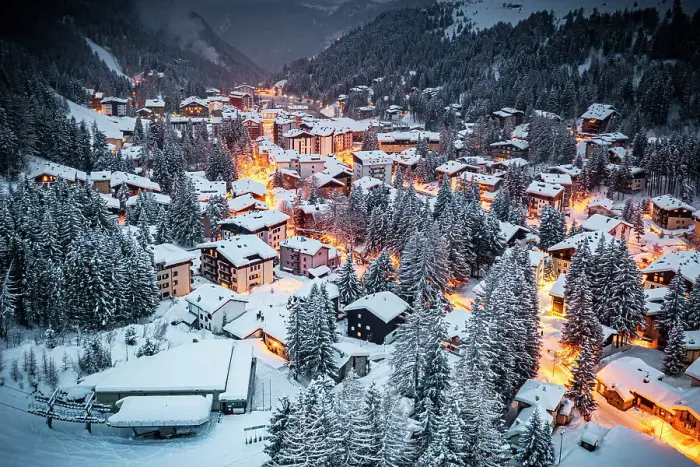 Framed Print : Overhead view of traditional snowy huts in the alpine village of Madesimo at dusk, Valle Spluga, Valtellina, Lombardy, Italy Framed Print : Overhead view of traditional snowy huts in the alpine village of Madesimo at dusk, Valle Spluga, Valtellina, Lombardy, Italy