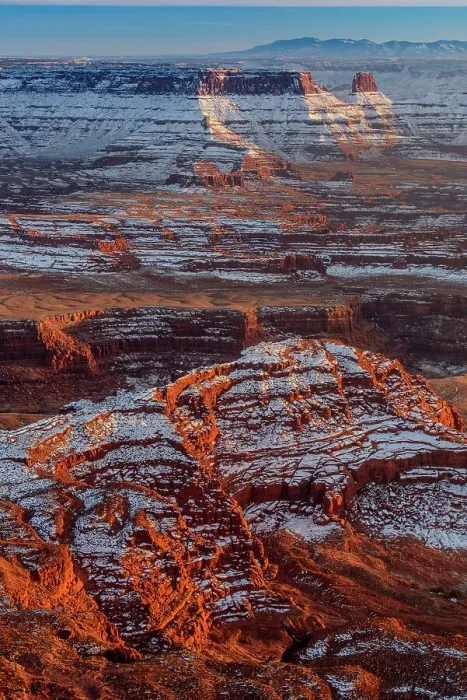 Framed Print : Overlooking snow covered eroded sandstone formations in the Colrado River canyon below Dead Horse Point, Dead Horse Point State Park, Utah, USA Framed Print : Overlooking snow covered eroded sandstone formations in the Colrado River canyon below Dead Horse Point, Dead Horse Point State Park, Utah, USA
