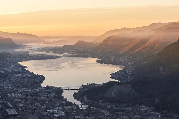 Overview of Adda river from San martino mount at dawn, Lecco, Lecco province, Lombardy