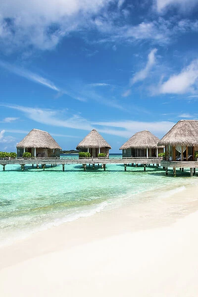 Overwater bungalows in a luxury resort, Baa Atoll, Maldives