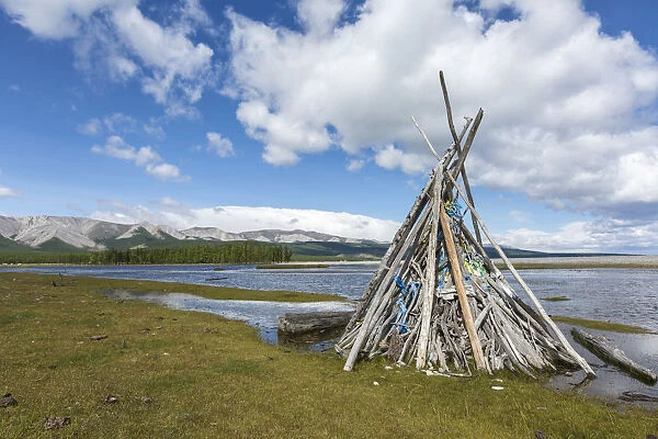 Ovoo made of wood on the shores of Hovsgol Lake. Hovsgol province, Mongolia