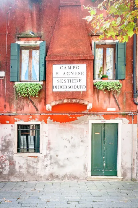 Framed Print : Painted facade of traditional house in an old alley of Venice, Veneto, Italy Framed Print : Painted facade of traditional house in an old alley of Venice, Veneto, Italy
