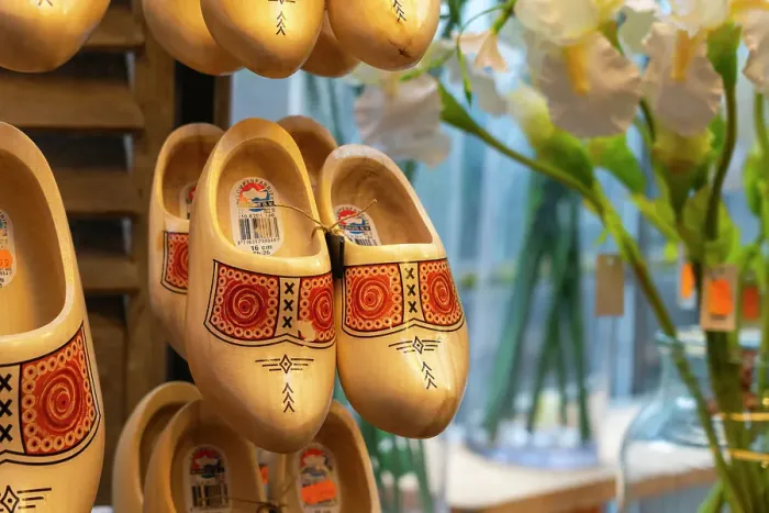 Framed Print : Pair of Dutch clogs hanging on display in shop, Amsterdam Framed Print : Pair of Dutch clogs hanging on display in shop, Amsterdam