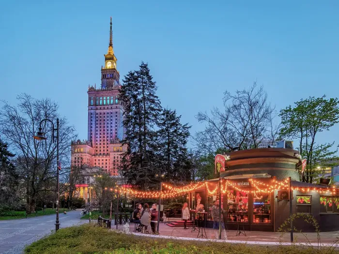 Framed Print : Palace of Culture and Science and Pijana Wisnia Wine Bar at dusk, Warsaw, Masovian Voivodeship, Poland