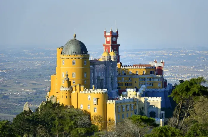 Framed Print : Palacio da Pena, built in the 19th century on the hills above Sintra, in the middle Framed Print : Palacio da Pena, built in the 19th century on the hills above Sintra, in the middle