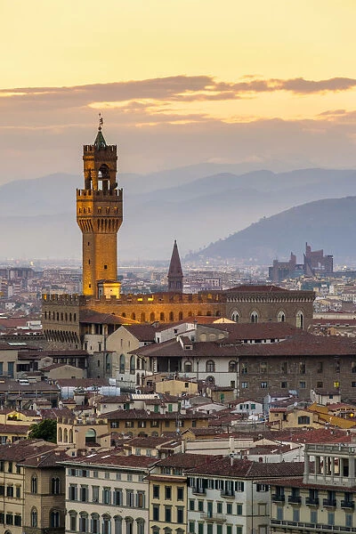 Palazzo Vecchio and buildings in the old town at sunset, Florence (Firenze), Tuscany