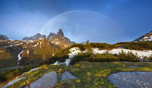 Pale di San Martino from Cavallazza at sunset with rainbow
